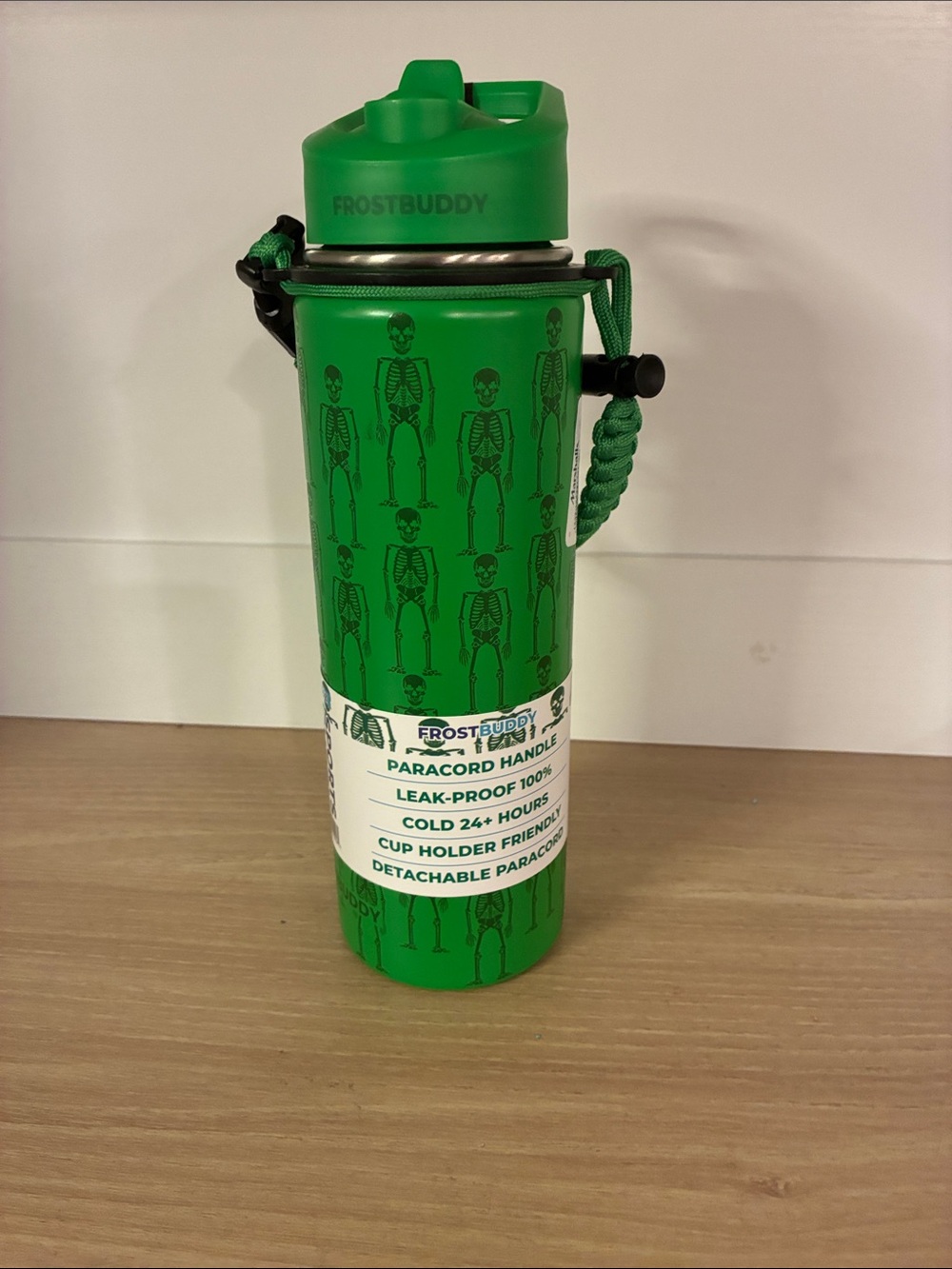Frostbuddy 24 oz Green Skeletons Insulated Water Bottle with Paracord Handle